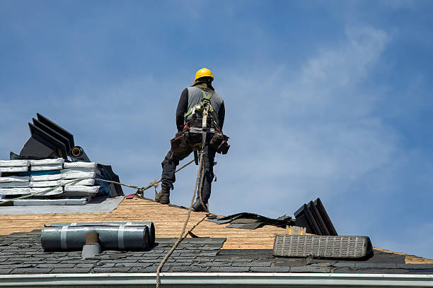 Professional Roof Replacement technician working in Brookville, OH